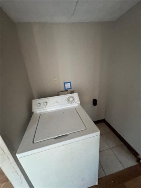 4707 Mariners Drive Stone Mountain, GA 30083 - Photo 20 of 25 a utility room with dryer and washer