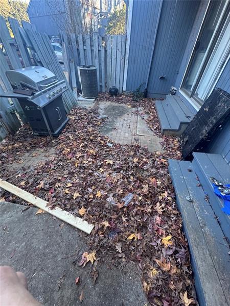 4707 Mariners Drive Stone Mountain, GA 30083 - Photo 25 of 25 a view of a backyard with wooden fence