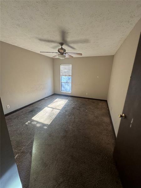 4707 Mariners Drive Stone Mountain, GA 30083 - Photo 5 of 25 an empty room with windows