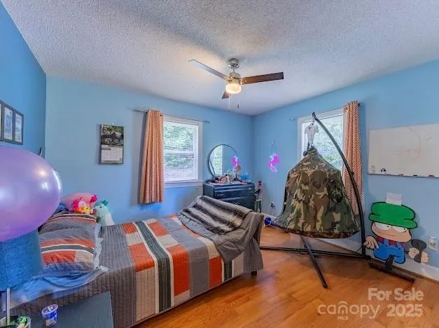 a bedroom with furniture and a bed