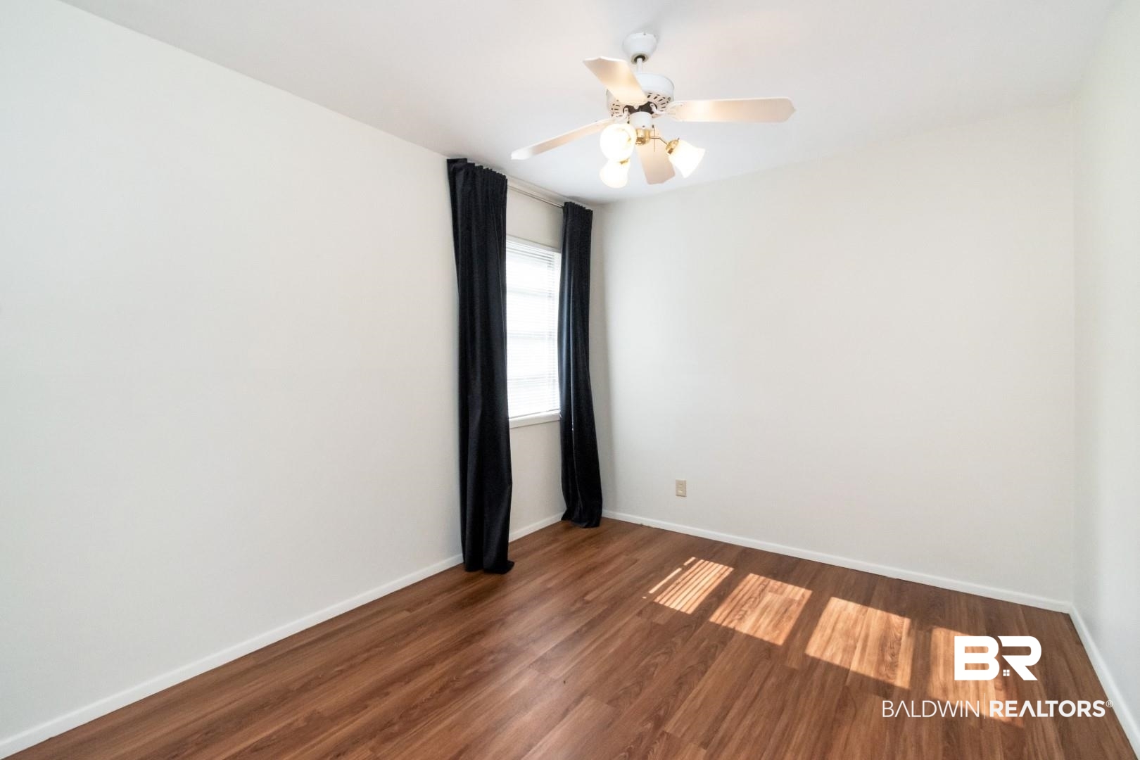 5412 South Norden Drive Mobile, AL 36608 - Photo 22 of 38 Unfurnished room featuring dark hardwood / wood-style flooring and ceiling fan