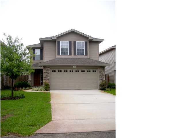 27 3rd Street Shalimar, FL 32579 - Photo 1 of 1 a front view of a house with garden