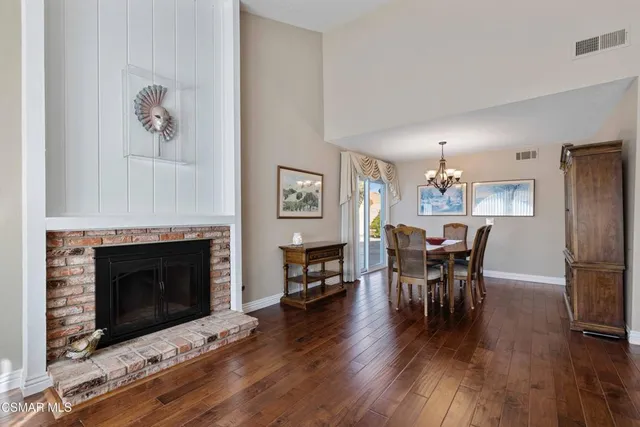 a view of a livingroom with furniture and a fireplace