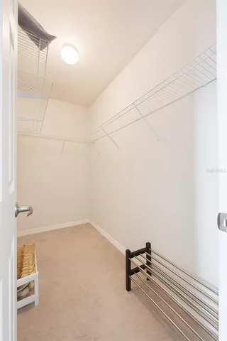 a view of a room with rack on the wall