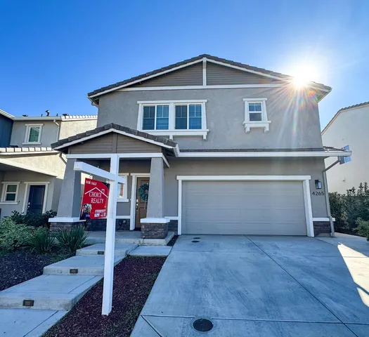 a front view of a house with an outdoor space