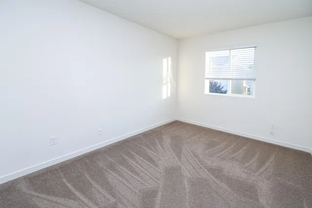 a view of a bathroom with a hallway