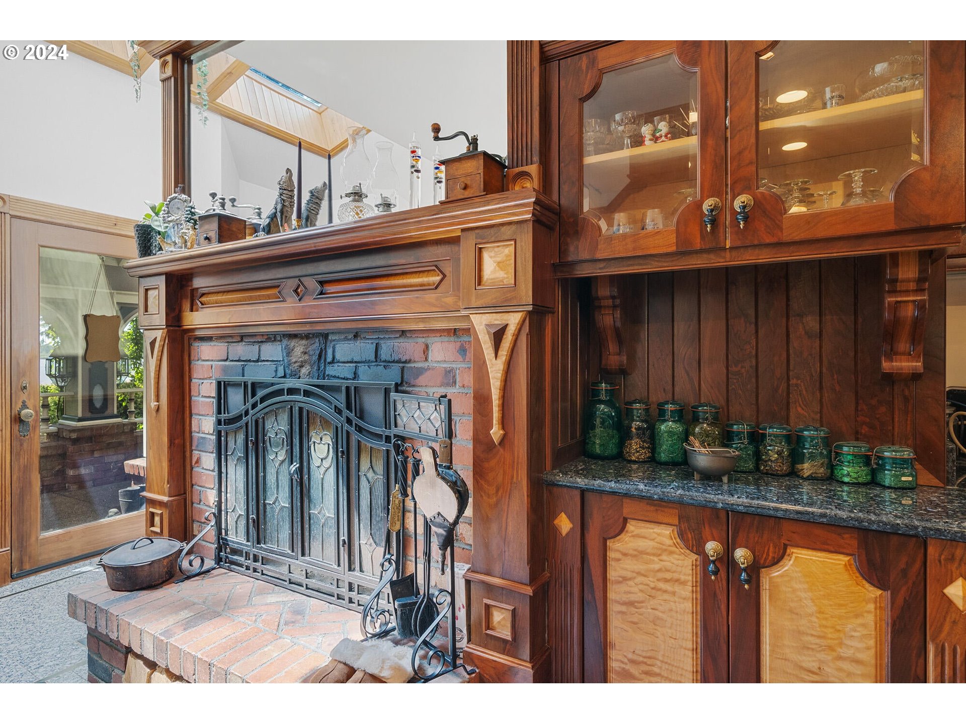 11250 Whiskey Creek Road Tillamook, OR 97141 - Photo 12 of 48 a view of living room with a fireplace and potted plants
