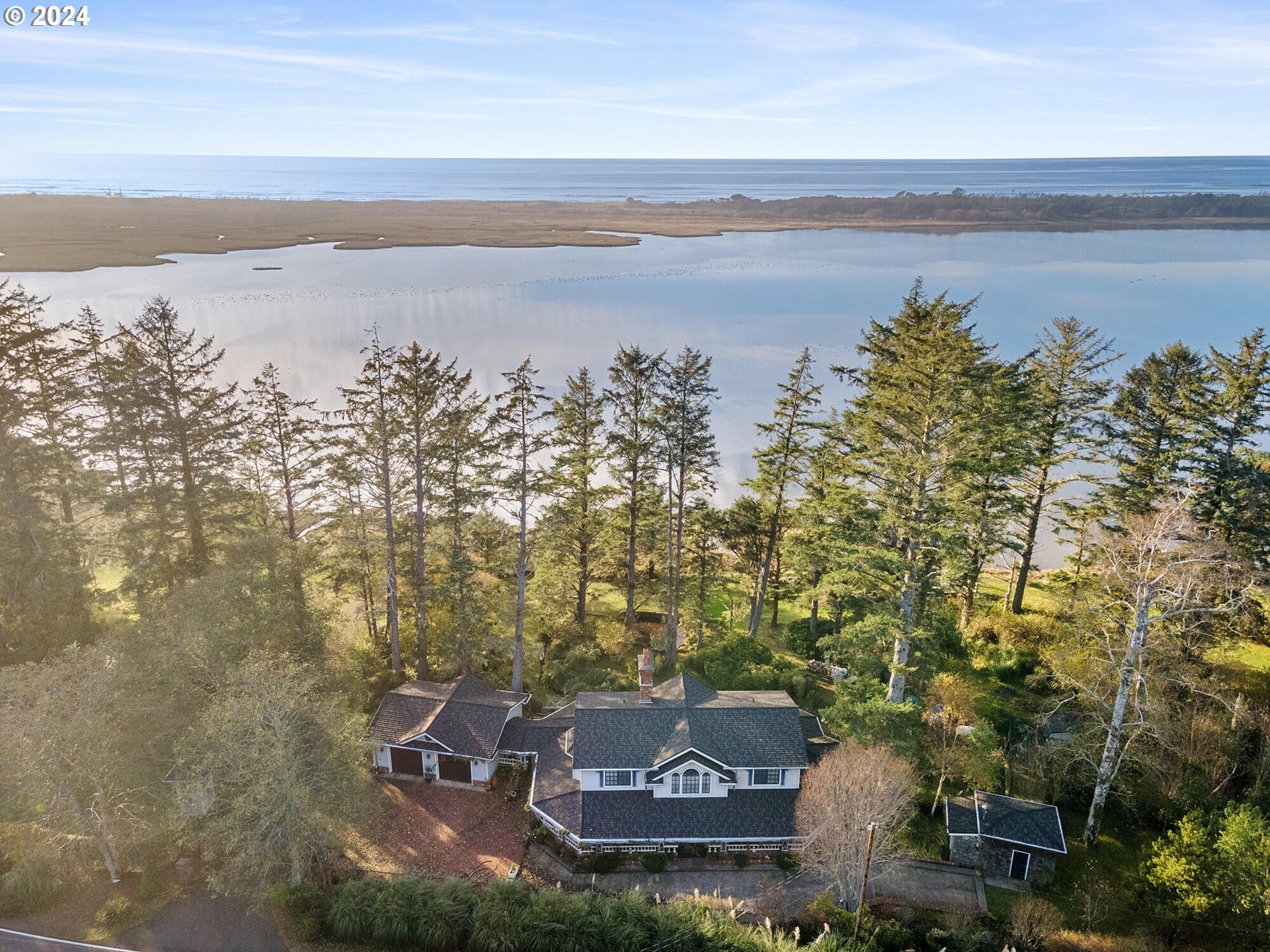 11250 Whiskey Creek Road Tillamook, OR 97141 - Photo 2 of 48 a view of lake with mountain in background