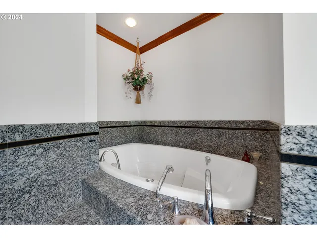 a bathroom with a toilet sink and a window