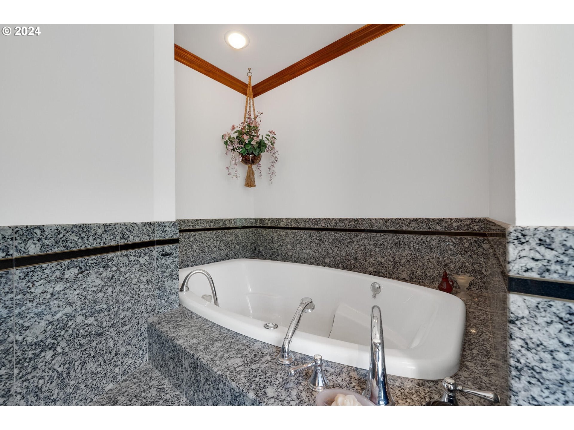 11250 Whiskey Creek Road Tillamook, OR 97141 - Photo 25 of 48 a bathroom with a bathtub and a sink