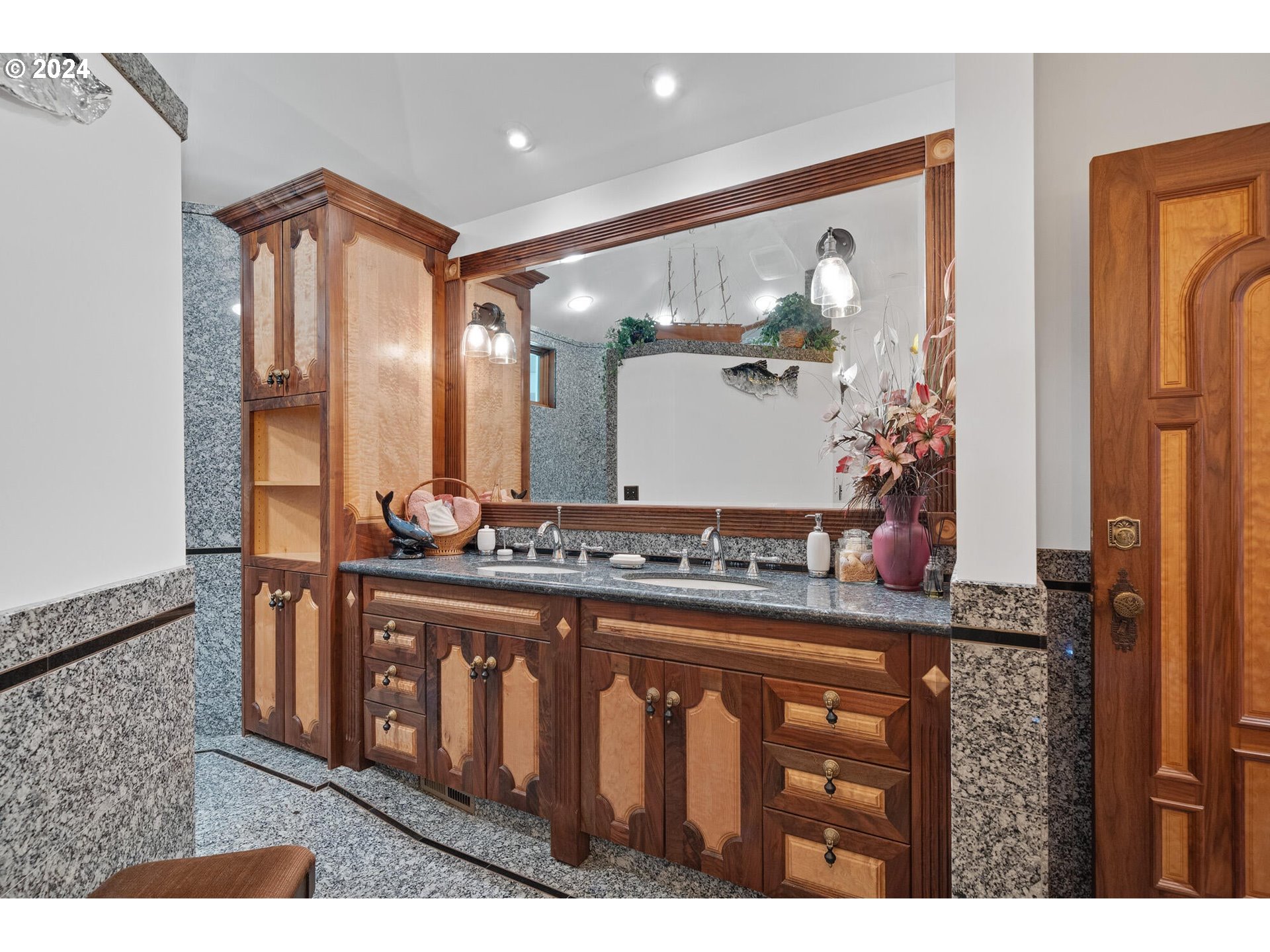 11250 Whiskey Creek Road Tillamook, OR 97141 - Photo 32 of 48 a bathroom with a sink vanity and a mirror