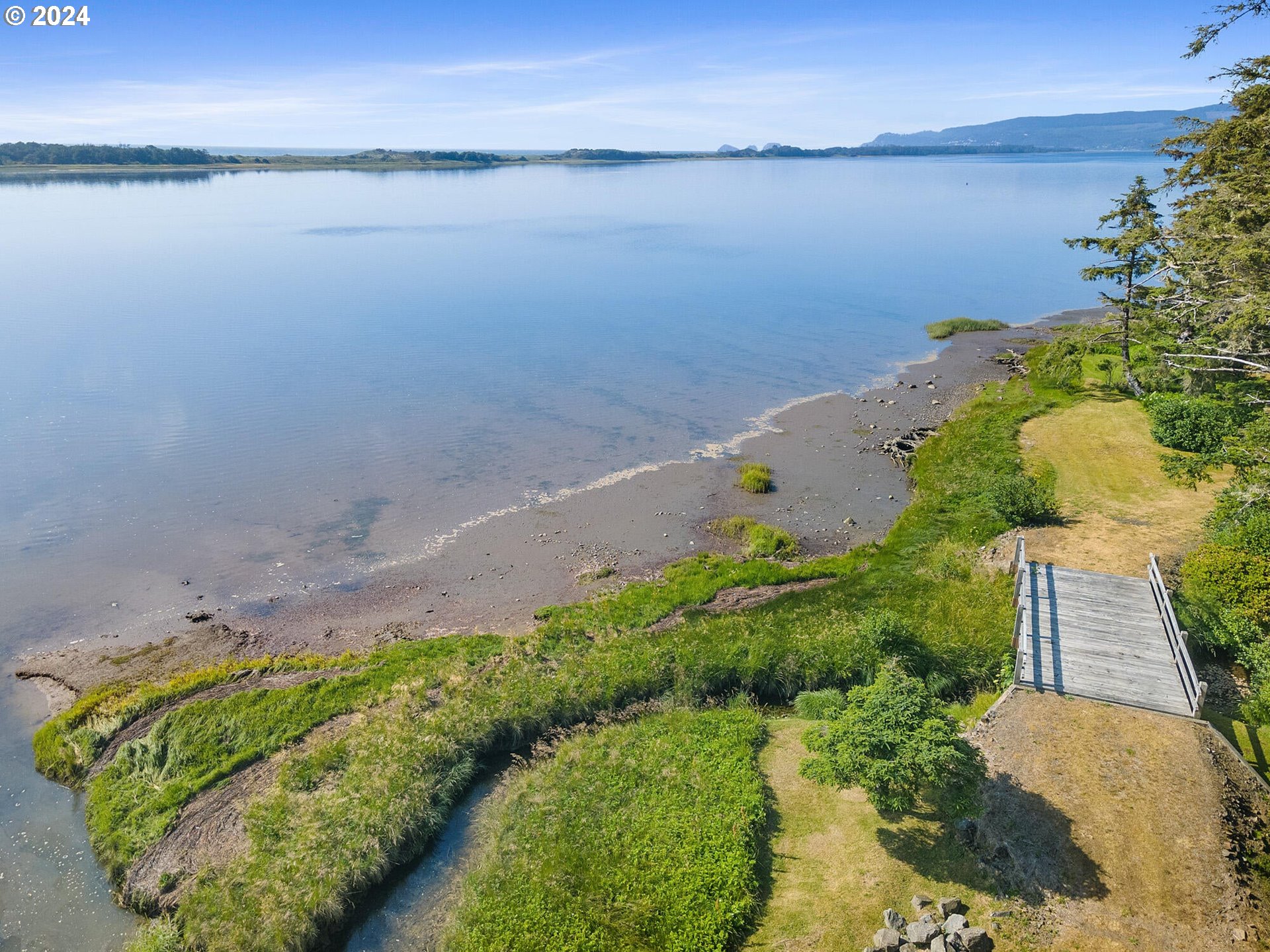 11250 Whiskey Creek Road Tillamook, OR 97141 - Photo 37 of 48 an aerial view of a houses with a lake view