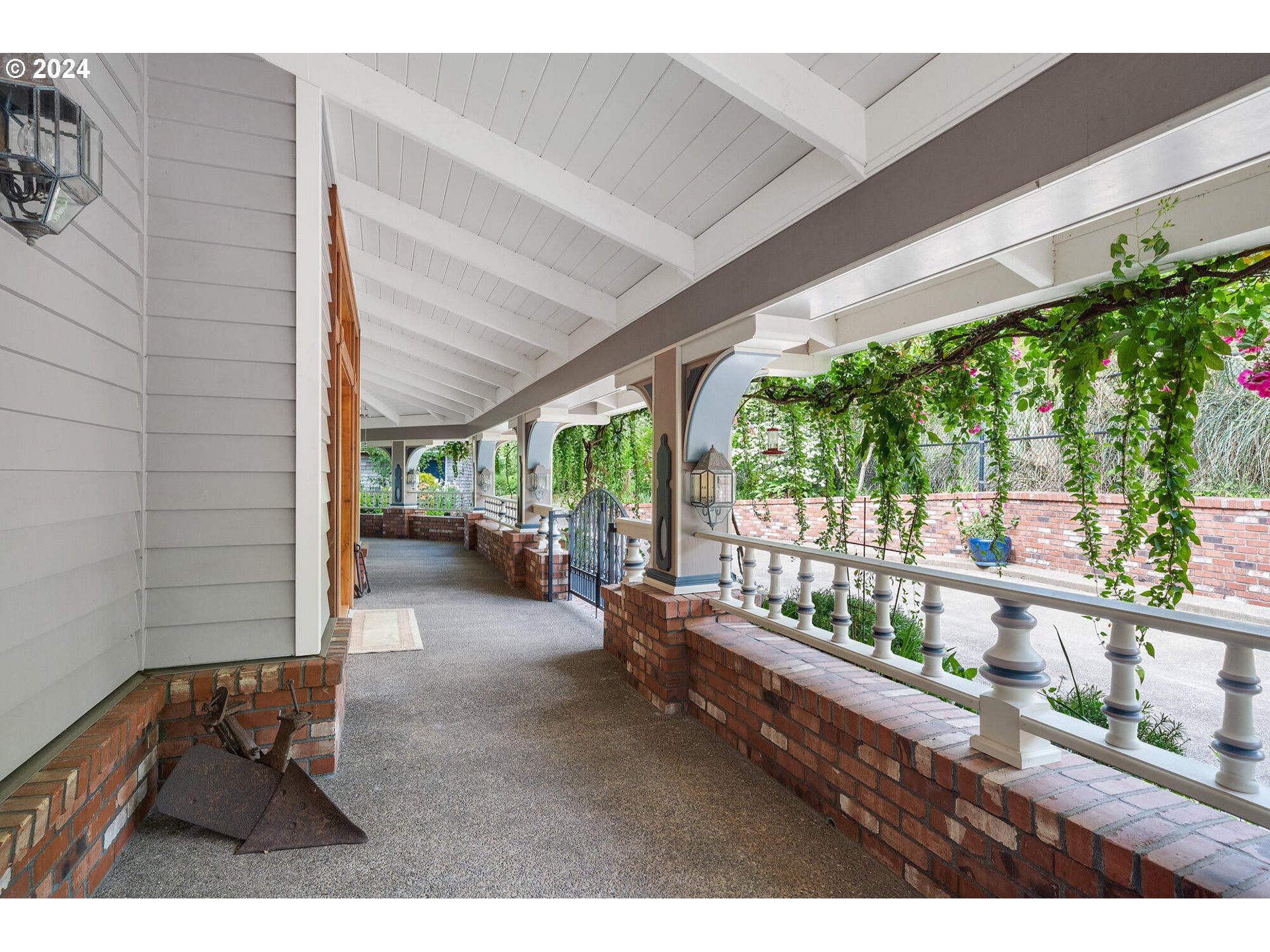 11250 Whiskey Creek Road Tillamook, OR 97141 - Photo 5 of 48 a balcony with furniture and garden view