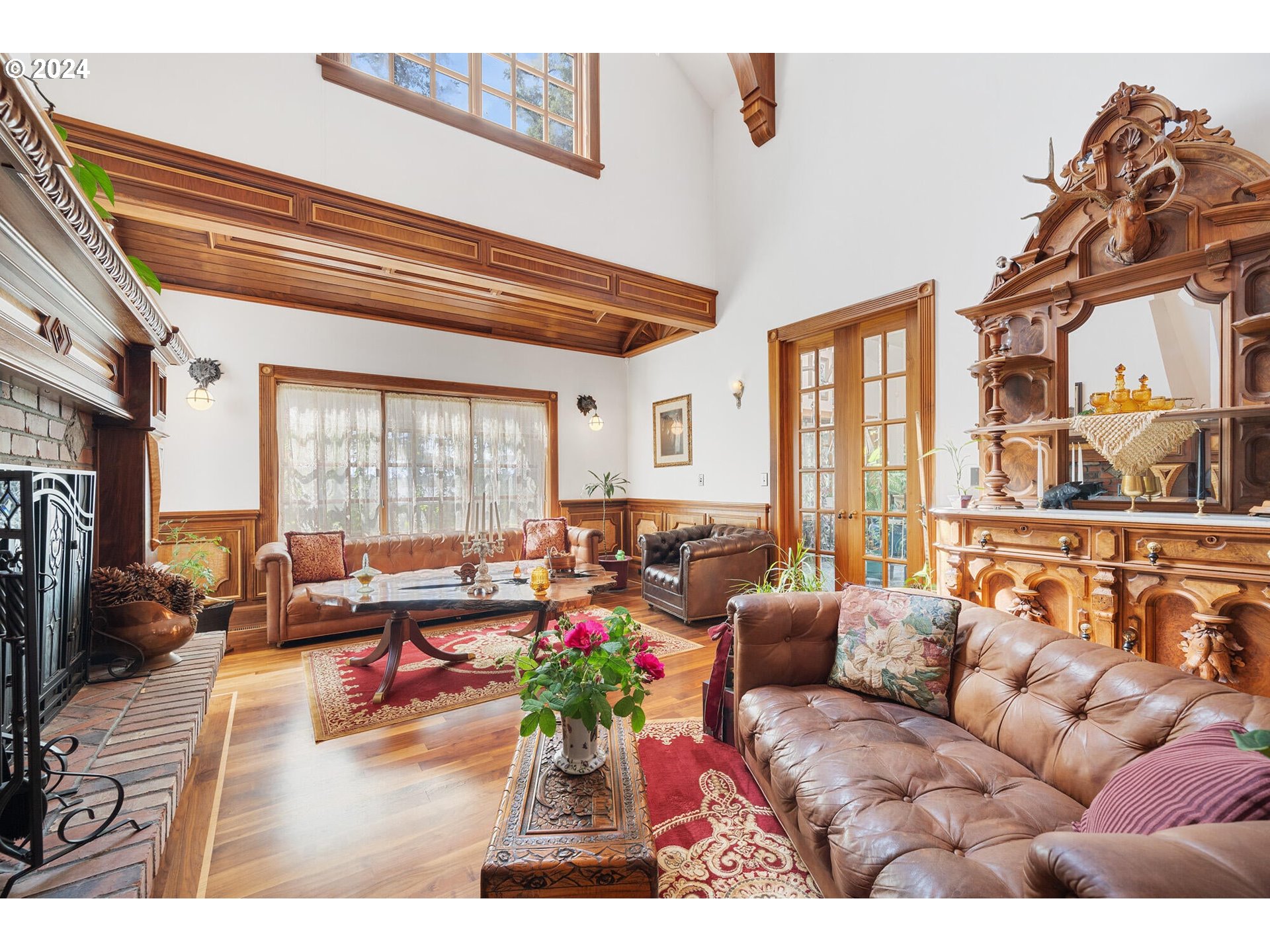 11250 Whiskey Creek Road Tillamook, OR 97141 - Photo 7 of 48 a living room with furniture and a large window