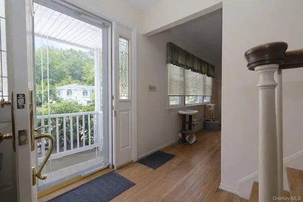 a kitchen with kitchen island granite countertop wooden cabinets a sink and a stove