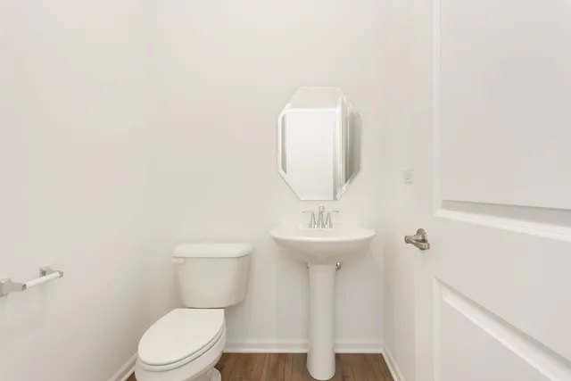 a kitchen with stainless steel appliances a sink stove and cabinets