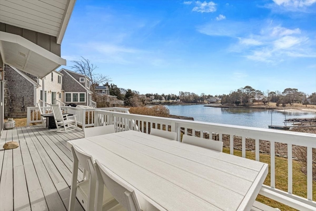 36 Benedict Road Bourne, MA 02532 - Photo 24 of 31 a view of a house with a roof deck