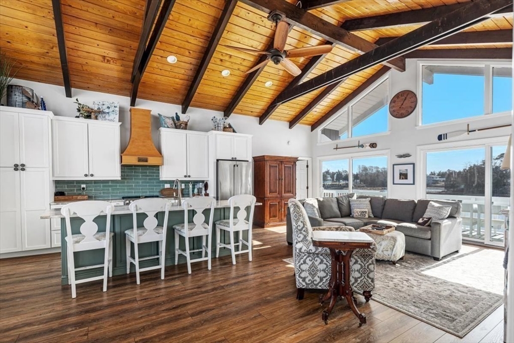 36 Benedict Road Bourne, MA 02532 - Photo 5 of 31 a living room with furniture and wooden floor