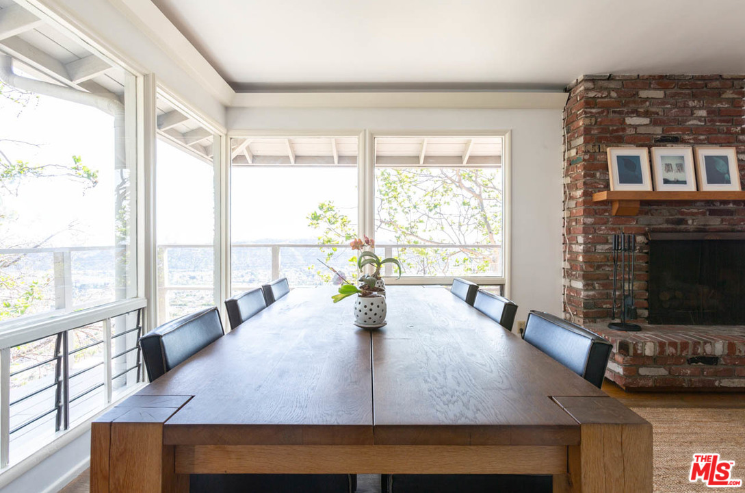 988 West Avenue 37 Los Angeles, CA 90065 - Photo 12 of 53 a living room with fireplace furniture and a large window