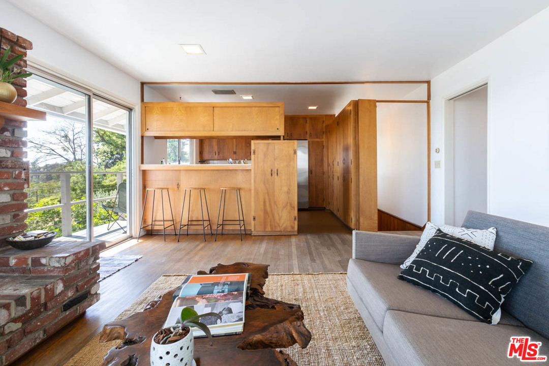 988 West Avenue 37 Los Angeles, CA 90065 - Photo 13 of 53 a living room with furniture and a large window