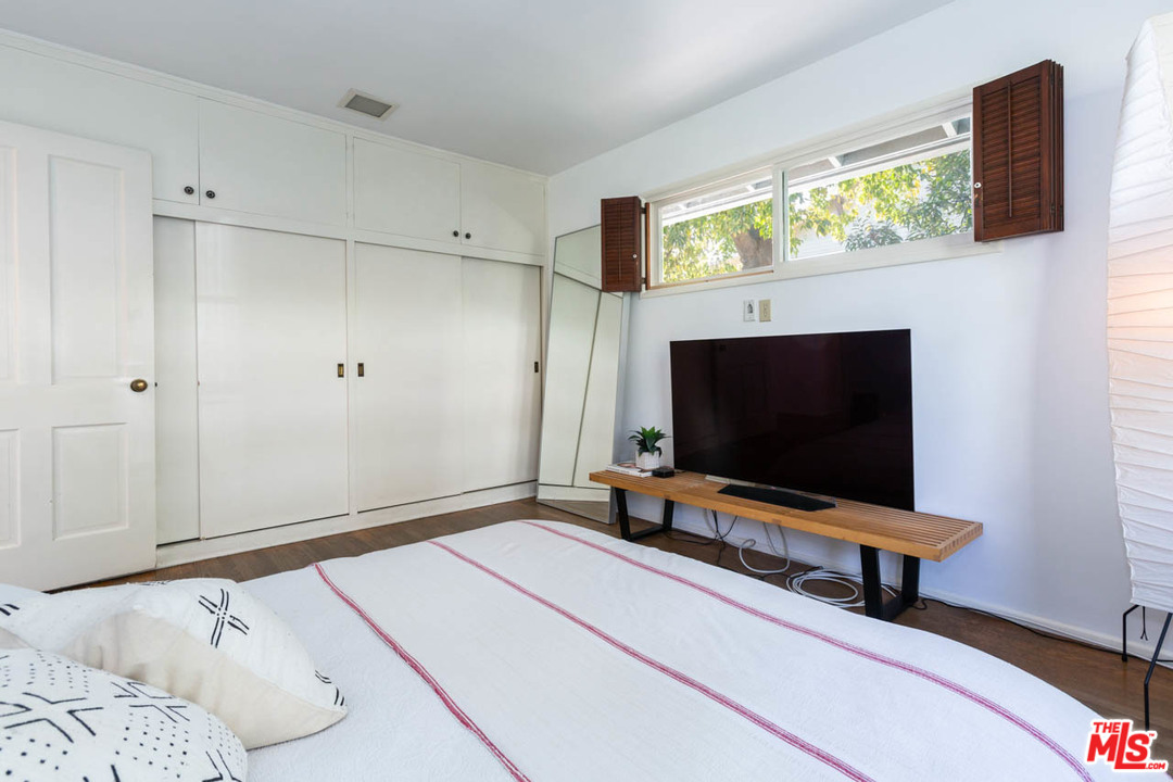 988 West Avenue 37 Los Angeles, CA 90065 - Photo 21 of 53 a bedroom with bed and flat screen tv