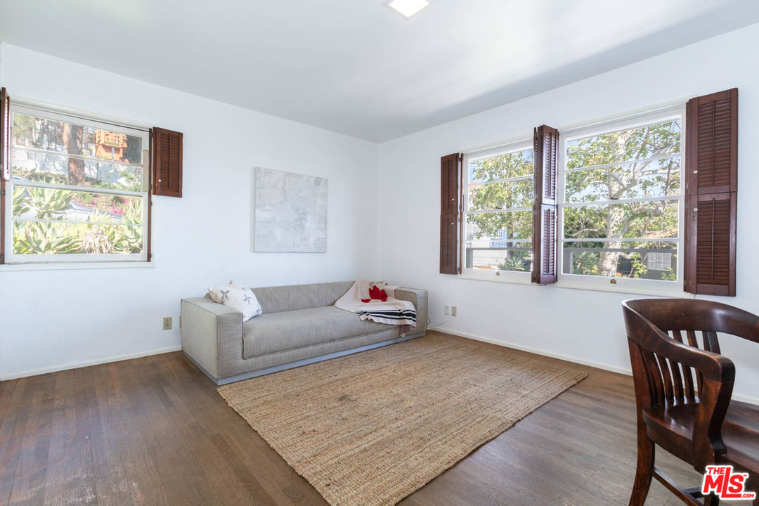 988 West Avenue 37 Los Angeles, CA 90065 - Photo 25 of 53 a living room with furniture and a window