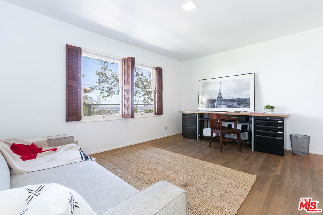 988 West Avenue 37 Los Angeles, CA 90065 - Photo 26 of 53 a living room with furniture and wooden floor