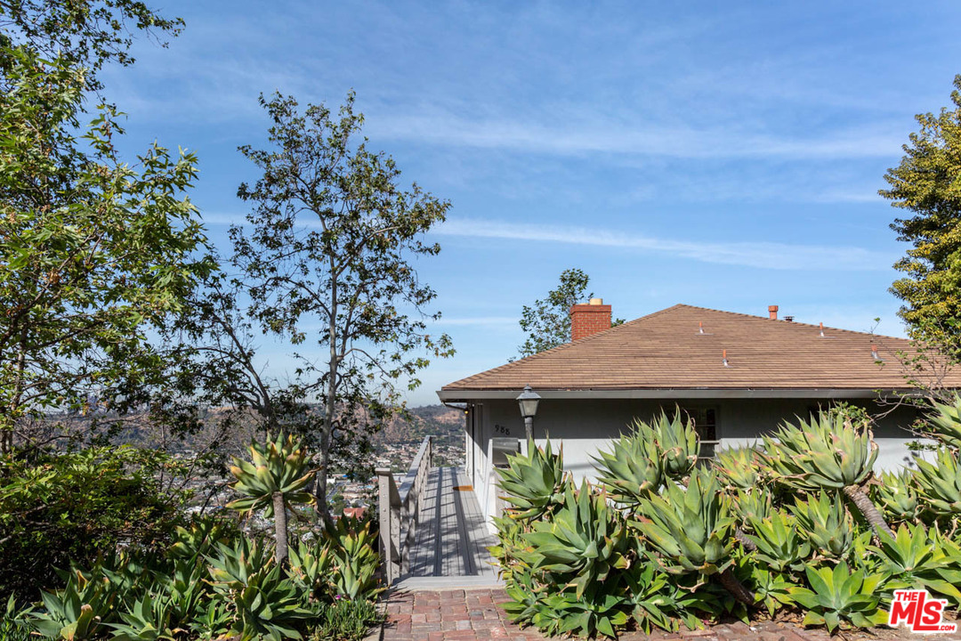 988 West Avenue 37 Los Angeles, CA 90065 - Photo 3 of 53 front view of a house with a yard