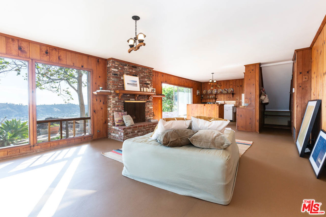 988 West Avenue 37 Los Angeles, CA 90065 - Photo 36 of 53 a bedroom with furniture and a large window