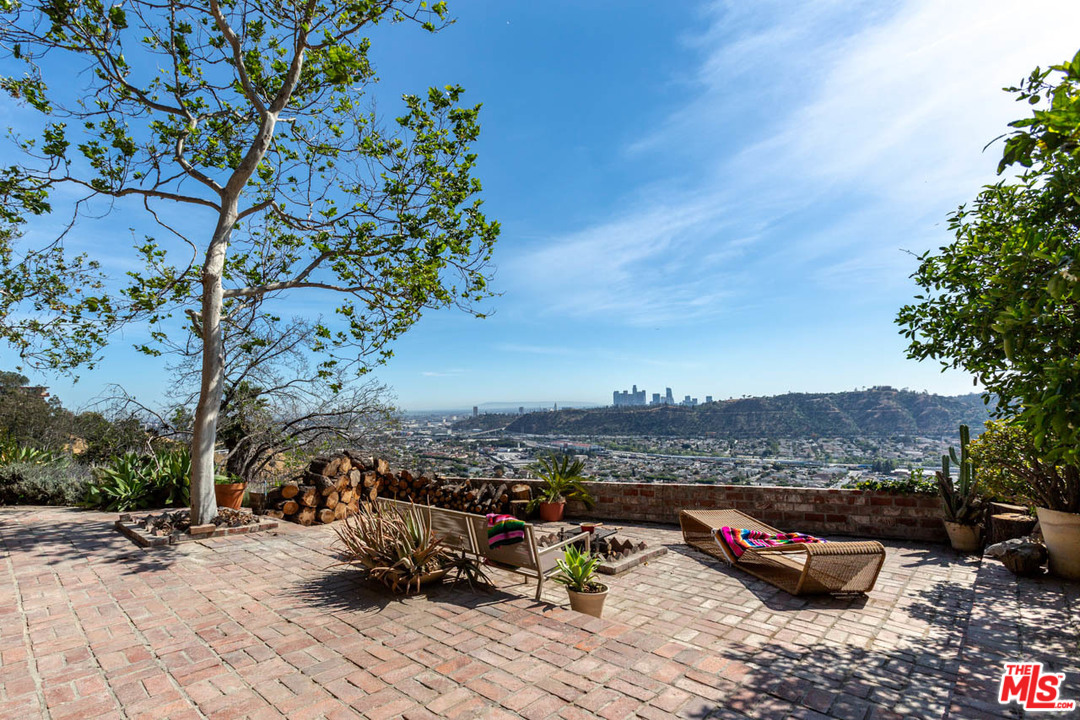 988 West Avenue 37 Los Angeles, CA 90065 - Photo 40 of 53 a view of a terrace with a bench