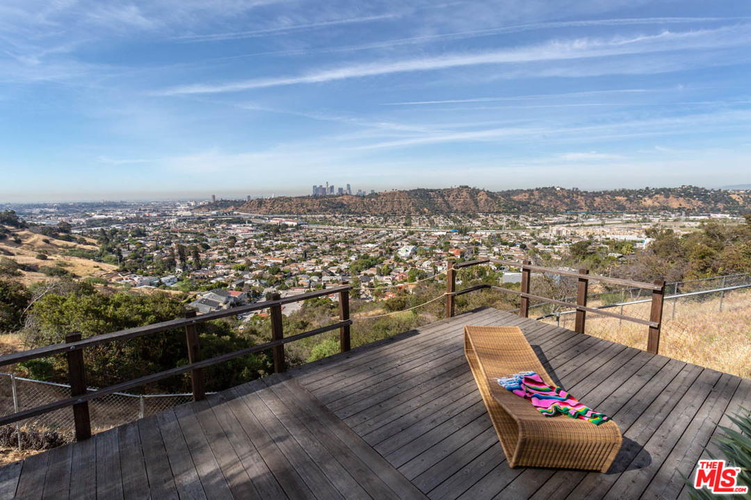 988 West Avenue 37 Los Angeles, CA 90065 - Photo 46 of 53 a view of a terrace with wooden benches