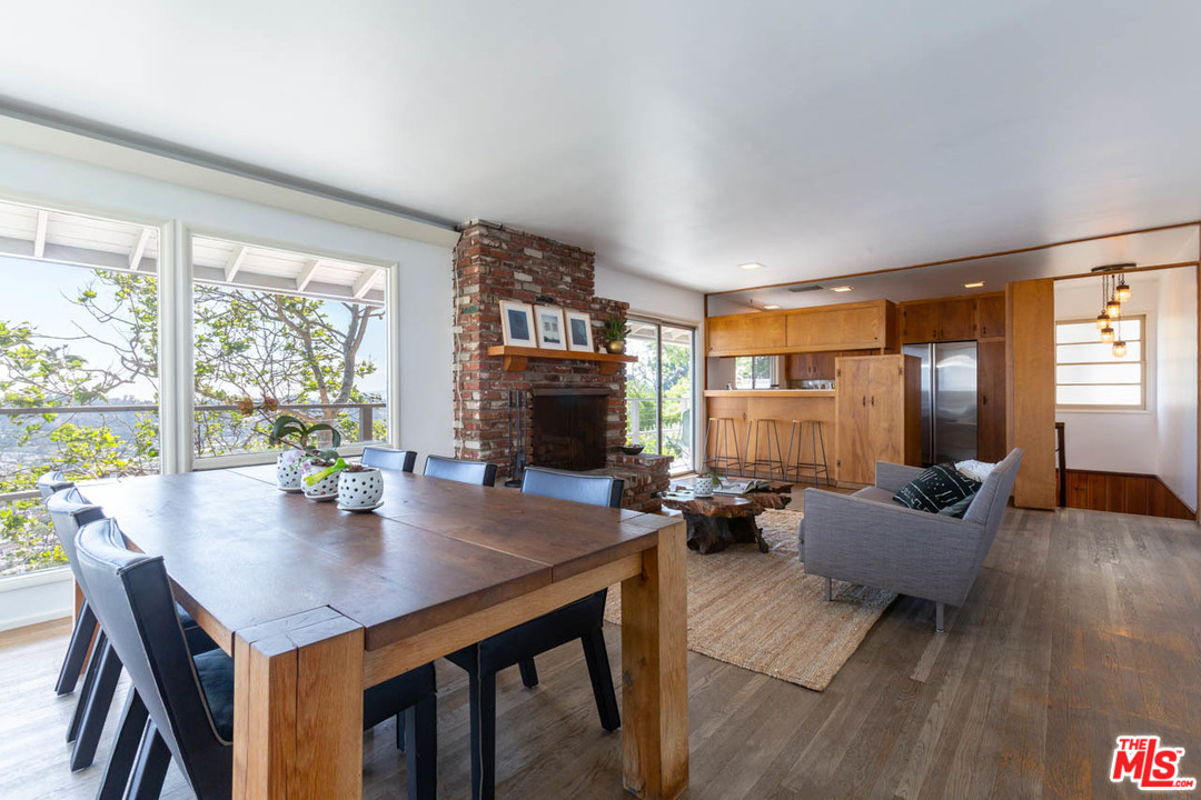 988 West Avenue 37 Los Angeles, CA 90065 - Photo 6 of 53 a living room with furniture and a fireplace