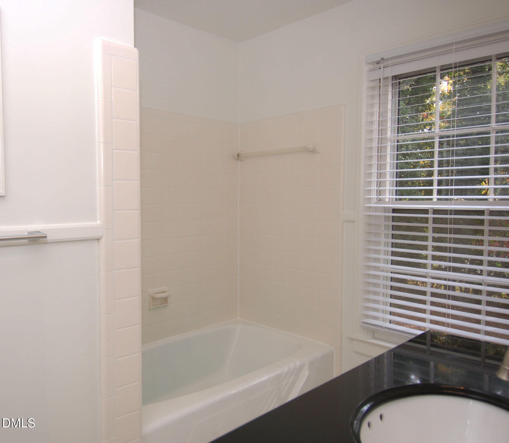 3225 Darien Drive Raleigh, NC 27607 - Photo 16 of 20 a bathroom with a sink and a toilet