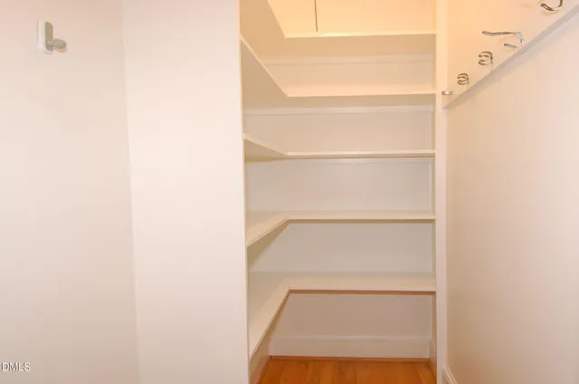 a close up view of walk in closet