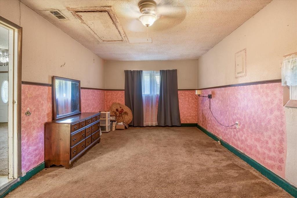 12379 Chapman Road Tyler, TX 75708 - Photo 11 of 40 a view of a refrigerator in a room