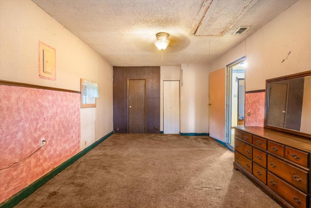 12379 Chapman Road Tyler, TX 75708 - Photo 12 of 40 a view of an empty room with a window