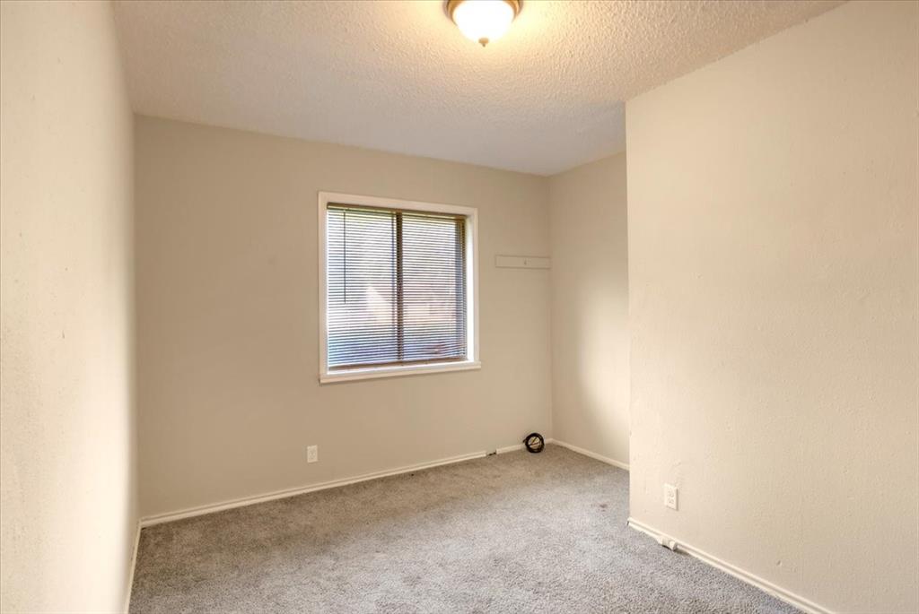 12379 Chapman Road Tyler, TX 75708 - Photo 20 of 40 an empty room with windows