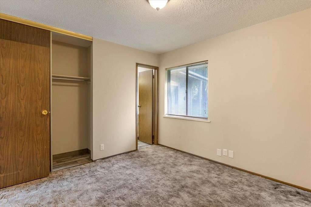 12379 Chapman Road Tyler, TX 75708 - Photo 24 of 40 a view of an empty room with windows and closet