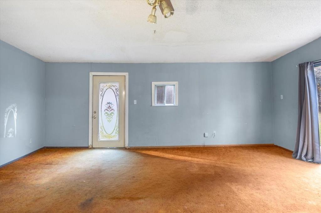 12379 Chapman Road Tyler, TX 75708 - Photo 29 of 40 an empty room with windows