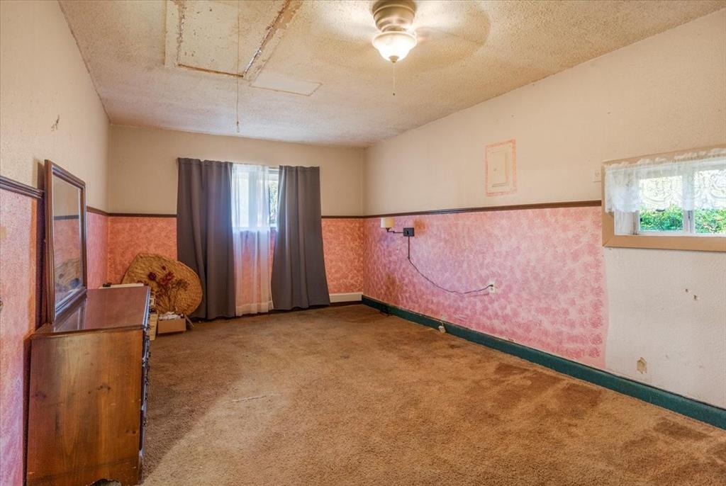 12379 Chapman Road Tyler, TX 75708 - Photo 9 of 40 an empty room with windows