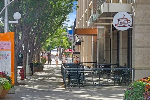 a view of street with sitting area