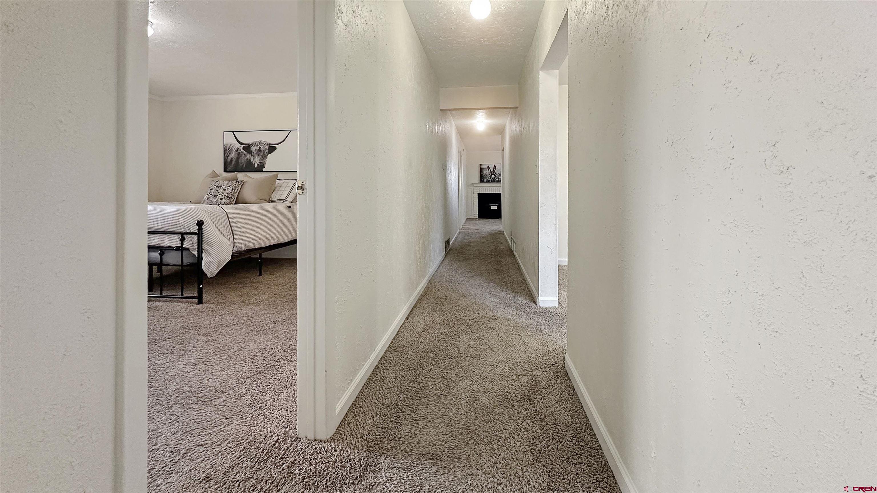 629 Norwood Road Montrose, CO 81403 - Photo 16 of 38 a view of a bedroom from hallway