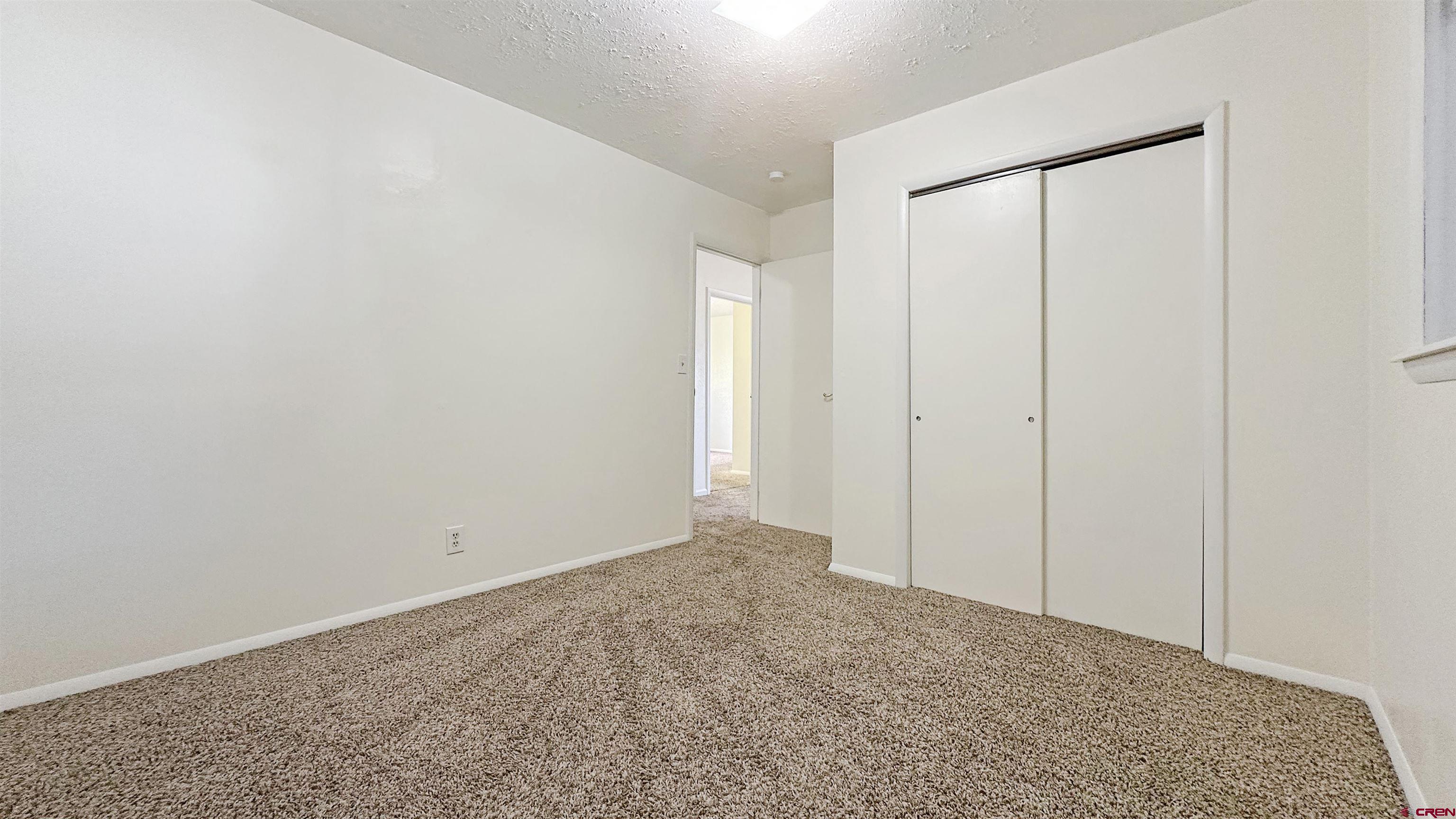 629 Norwood Road Montrose, CO 81403 - Photo 17 of 38 a view of an empty room