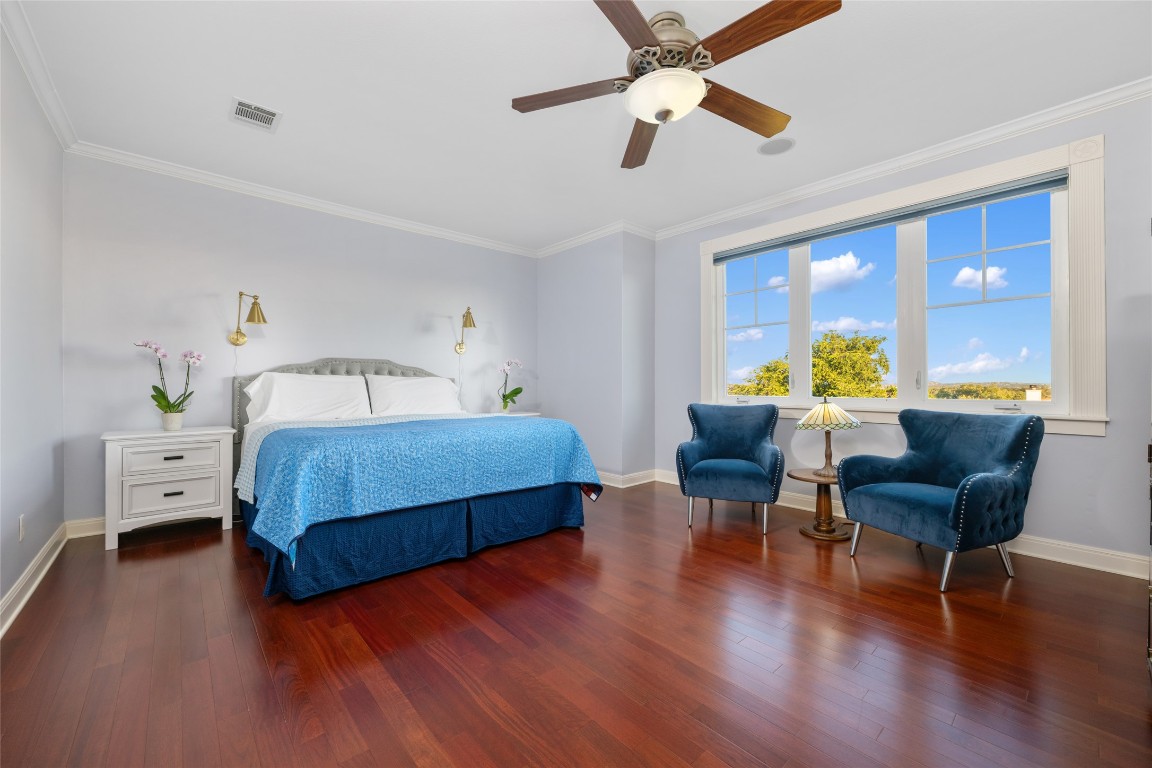 20403 Highland Lake Drive Lago Vista, TX 78645 - Photo 19 of 40 a bedroom with furniture and wooden floor