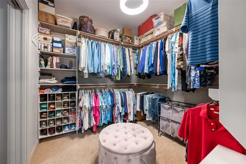 a view of washer and dryer with kitchen view