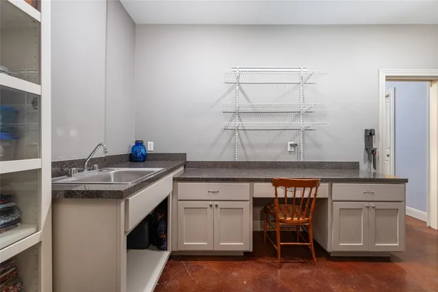 a view of kitchen with furniture and wooden floor