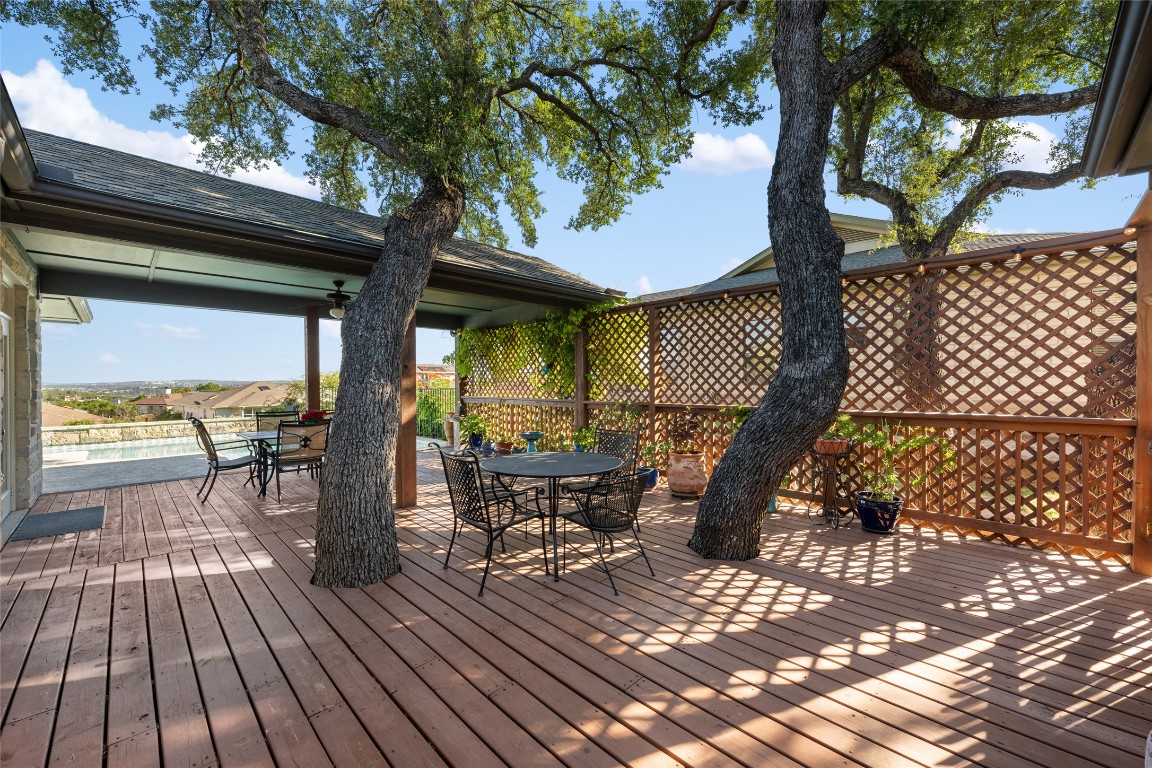 20403 Highland Lake Drive Lago Vista, TX 78645 - Photo 30 of 40 a view of balcony with wooden floor and outdoor seating