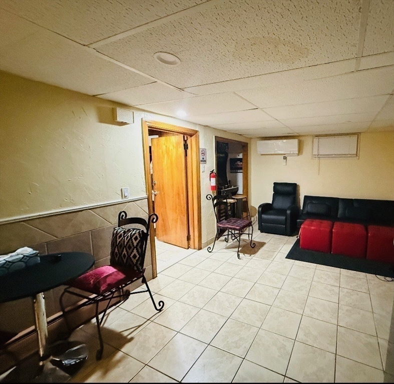 41 Shurtleff Street Revere, MA 02151 - Photo 3 of 12 a room with furniture and air hockey table