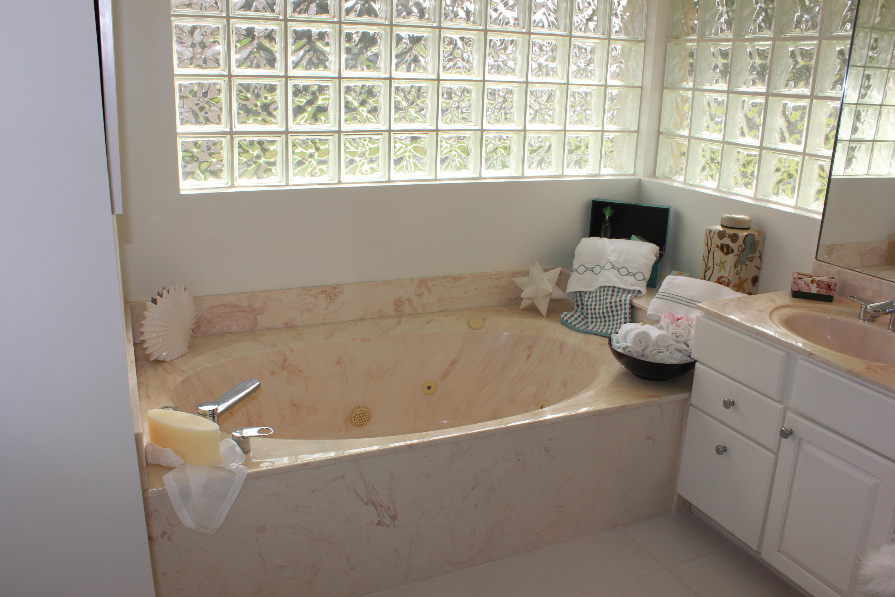 2671 Northwest 49th Street Boca Raton, FL 33434 - Photo 31 of 47 a bath tub sitting next to a window
