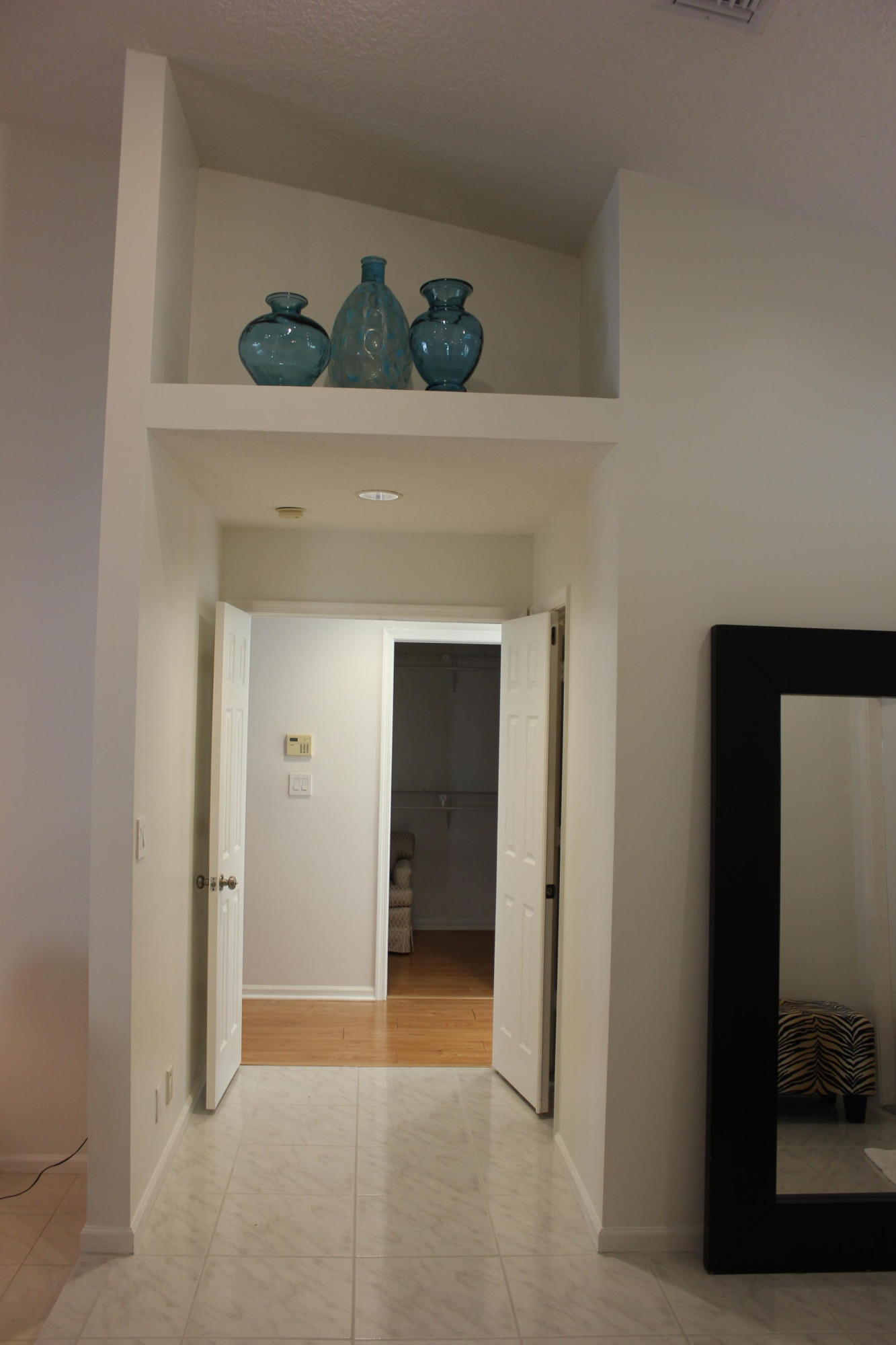 2671 Northwest 49th Street Boca Raton, FL 33434 - Photo 39 of 47 a view of entryway with a hallway